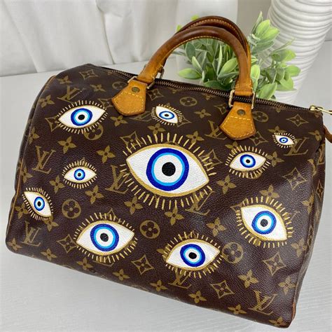 louis vuitton evil eye purse|louis vuitton epi leather wallet.